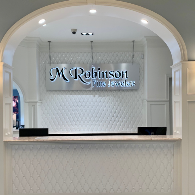 Putting Your Brand Front and Center: Custom Reception Desks for Luxury Stores